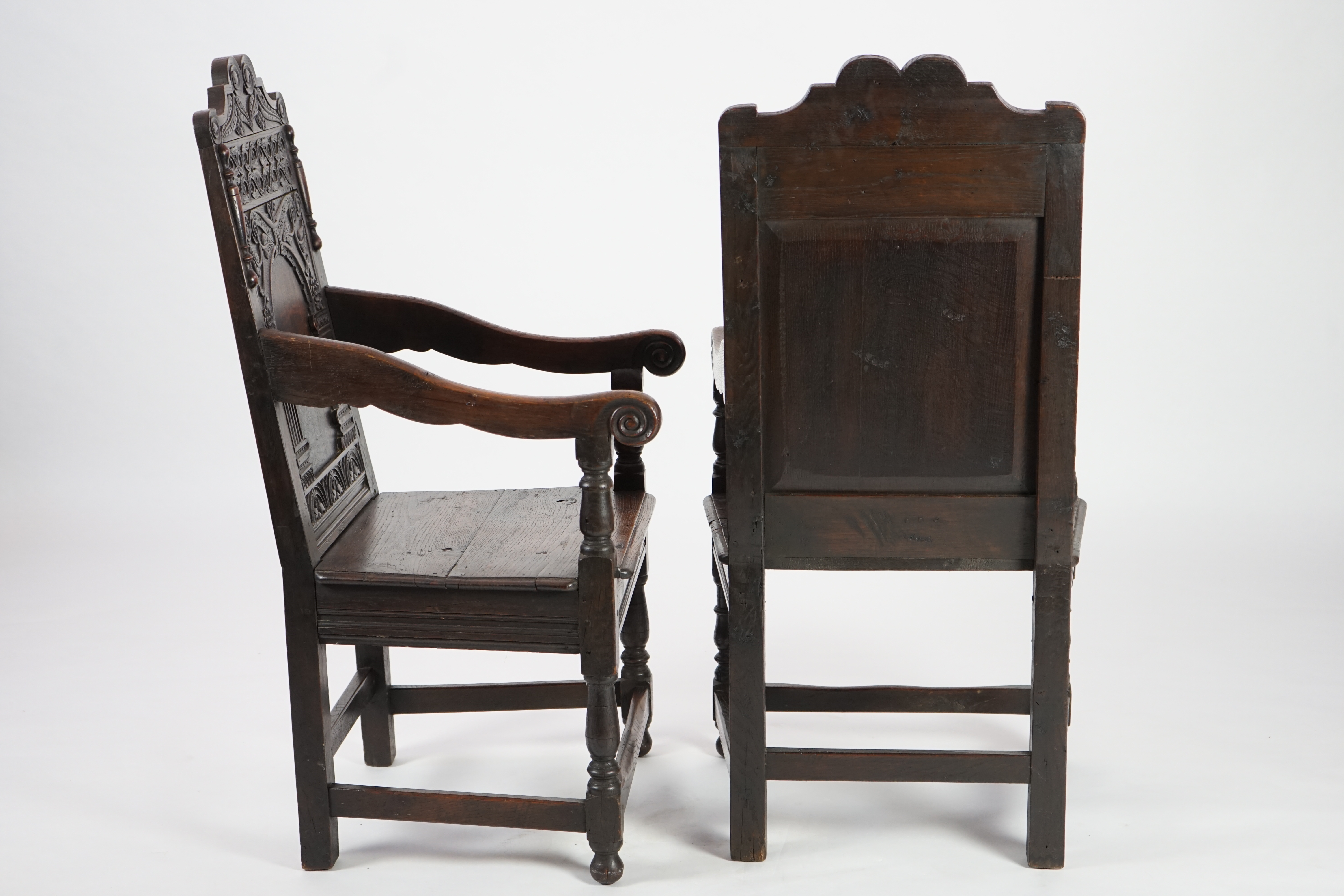 A pair of 17th century style oak Wainscot chairs